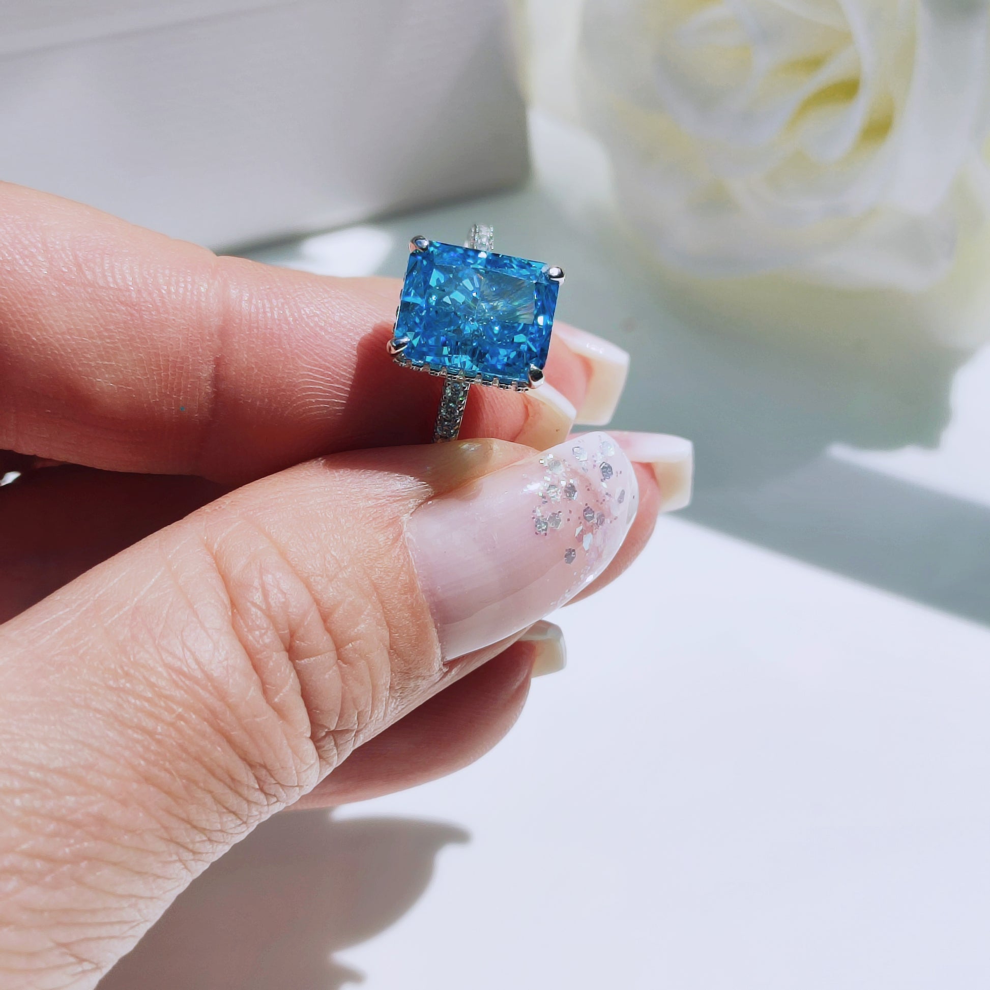 Sterling Silver Blue Radiant Cubic Zirconia HALO Ring - Mia Ishaaq