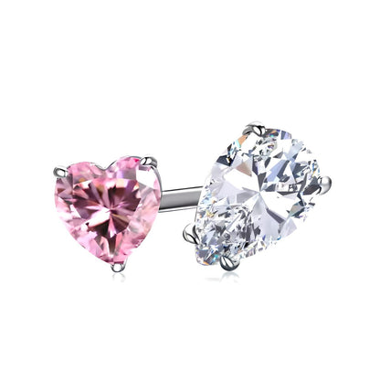 The Mia Ishaaq Sterling Silver Radiant Duo Ring - adjustable showcases a heart-shaped pink gemstone and a pear-shaped clear cubic zirconia stone, elegantly set on a sleek silver band.