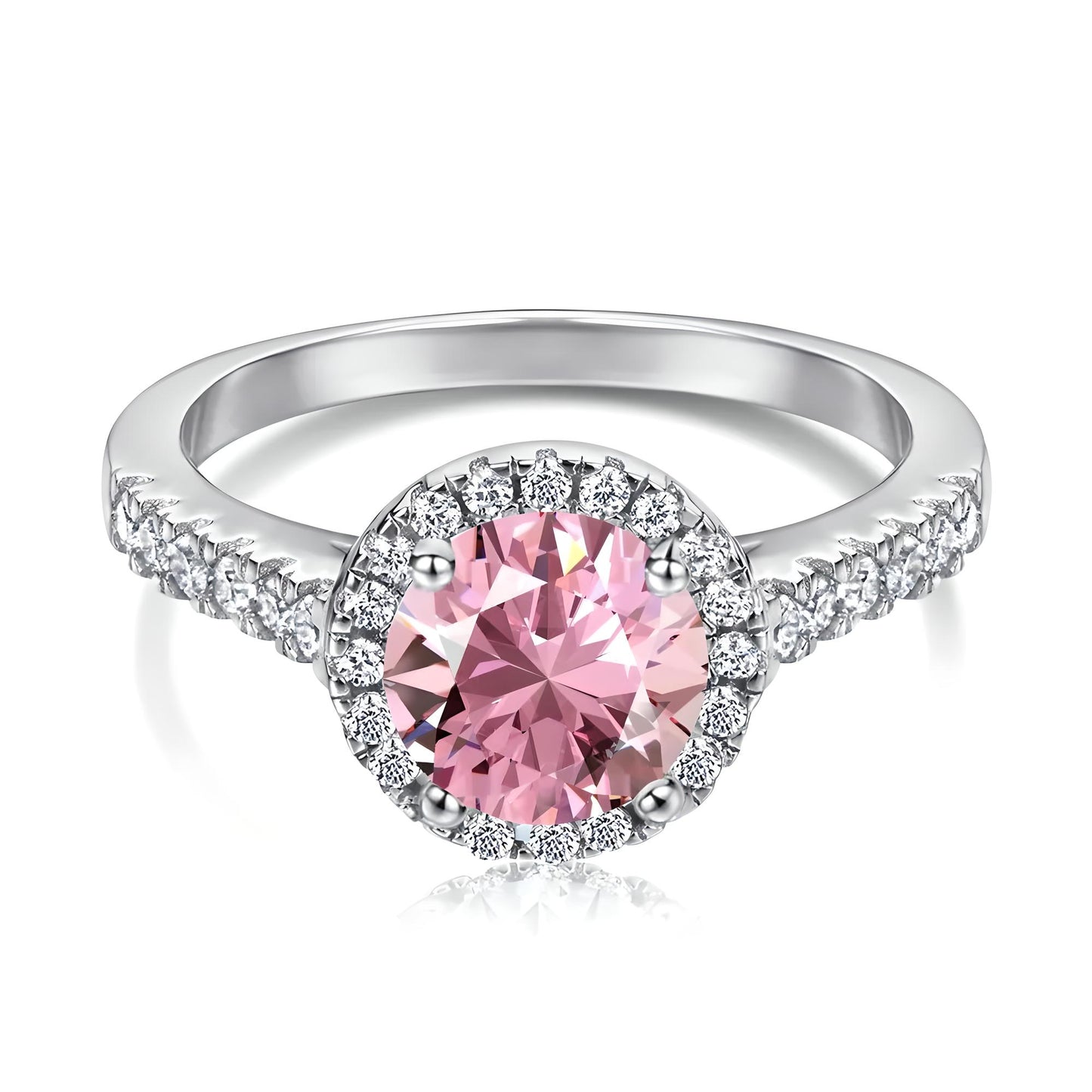 Close-up view of the pink cubic zirconia halo solitaire ring on a pure white background, showcasing the sparkling clear cubic zirconia stones surrounding the band - Mia Ishaaq