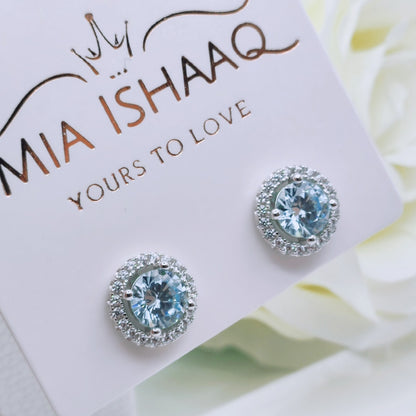 925 Sterling Silver White Gold Plated Aquamarine Blue Cubic Zirconia Round Stud Earrings - Mia Ishaaq