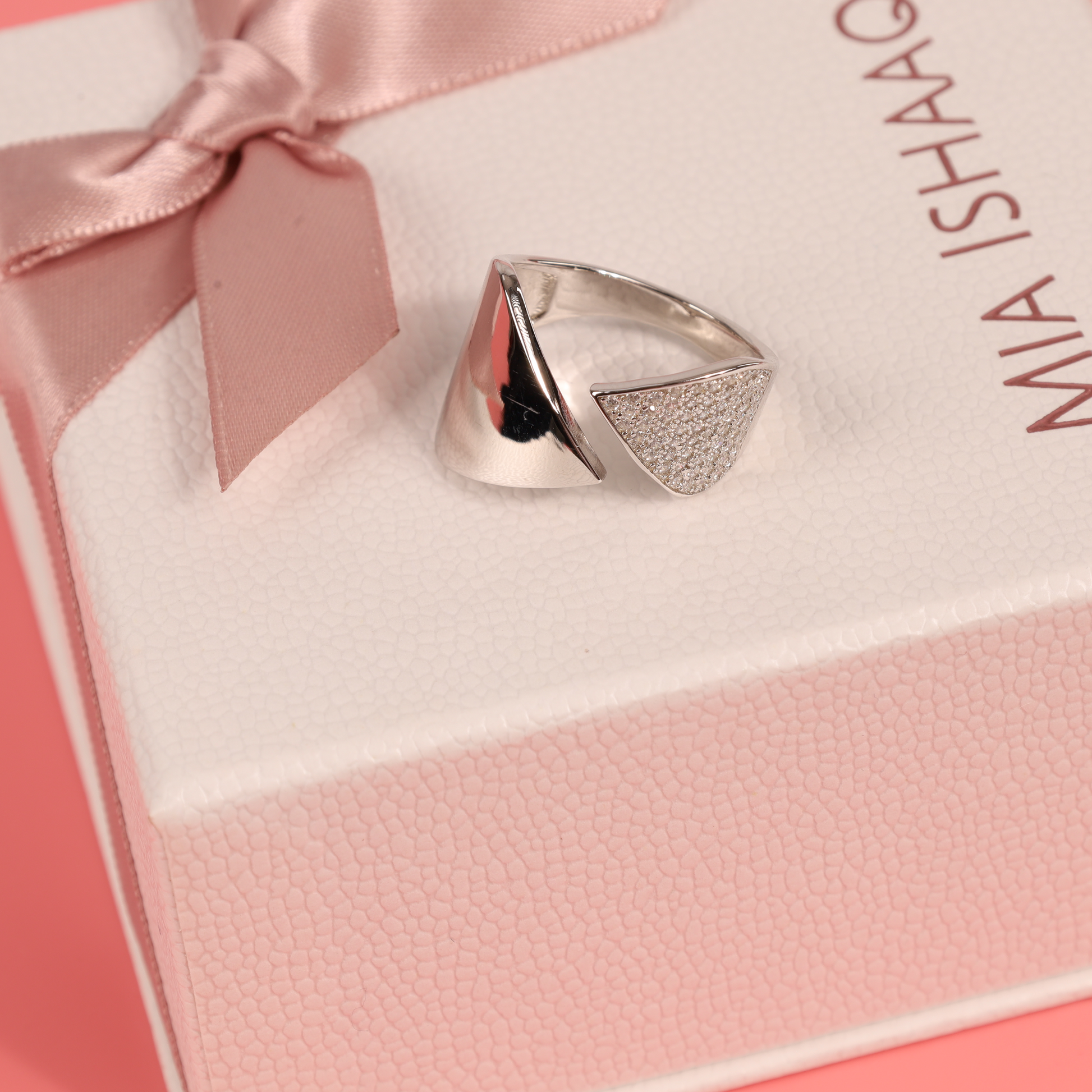 Sterling silver Arrow of Elegance Ring displayed on a white background, highlighting the unique arrow-shaped open design and wider top band - Mia Ishaaq