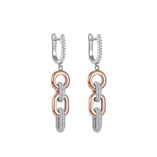 Dangle earrings on a white background, featuring sterling silver with rose gold plating and chunky cubic zirconia links - Mia Ishaaq