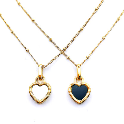 2 18k gold plated stainless steel reversible enamel heart pendant beaded chain necklaces overcrossing each other on a plain white background - Mia Ishaaq