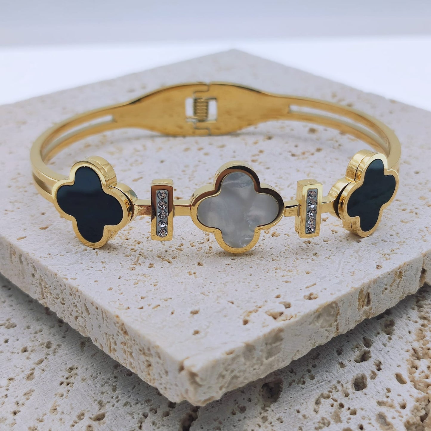 Image: Sparkling 18K gold four-leaf clover bracelet, designed for enduring elegance. Waterproof and stylish accessory for a timeless charm - Mia Ishaaq