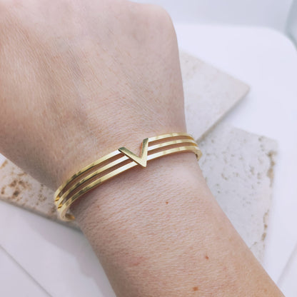 18k PVD Gold Plated Stainless steel V line victory through harmony bangle bracelet - Mia Ishaaq