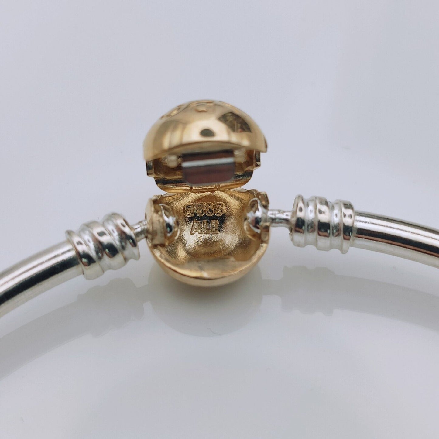 Pandora marking on the inside of the 14k ball clasp bracelet - Mia Ishaaq