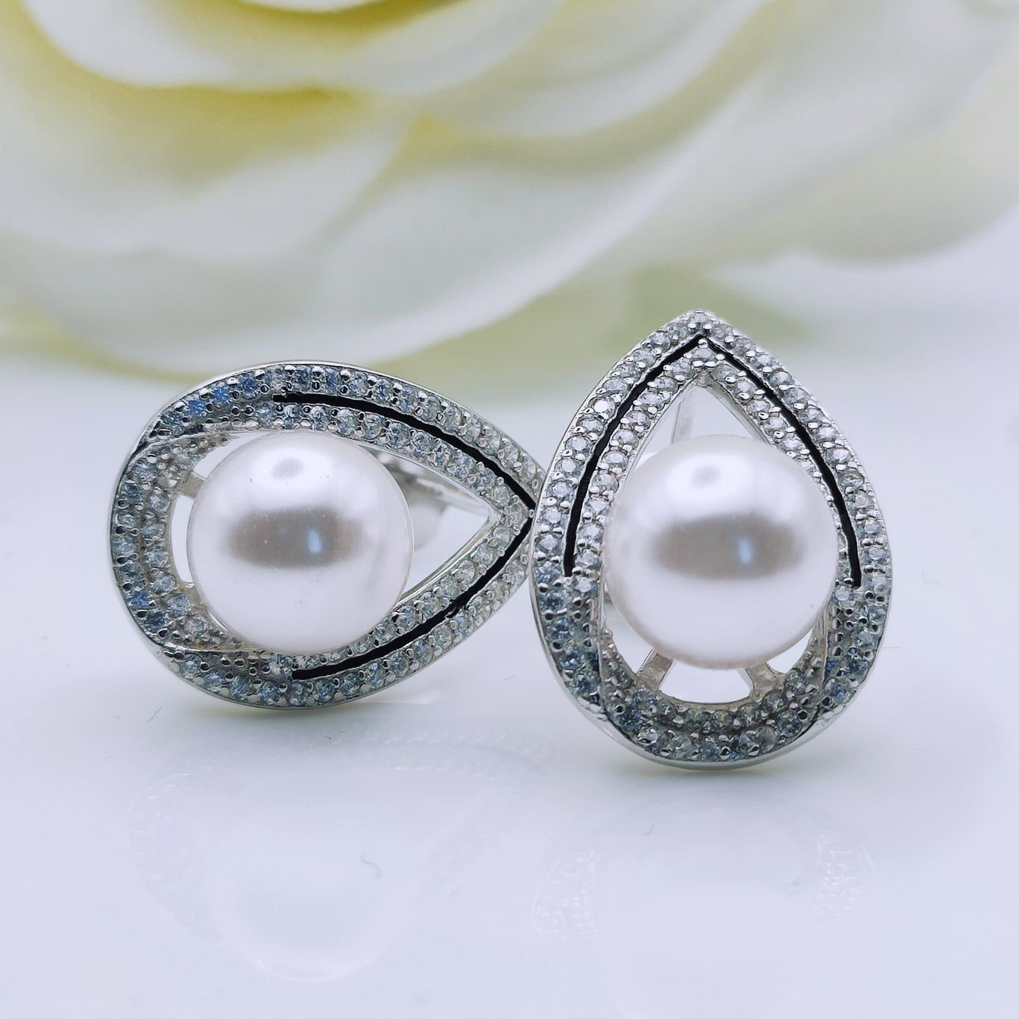 sterling silver shell pearl cubic zirconia stud earrings - Mia Ishaaq