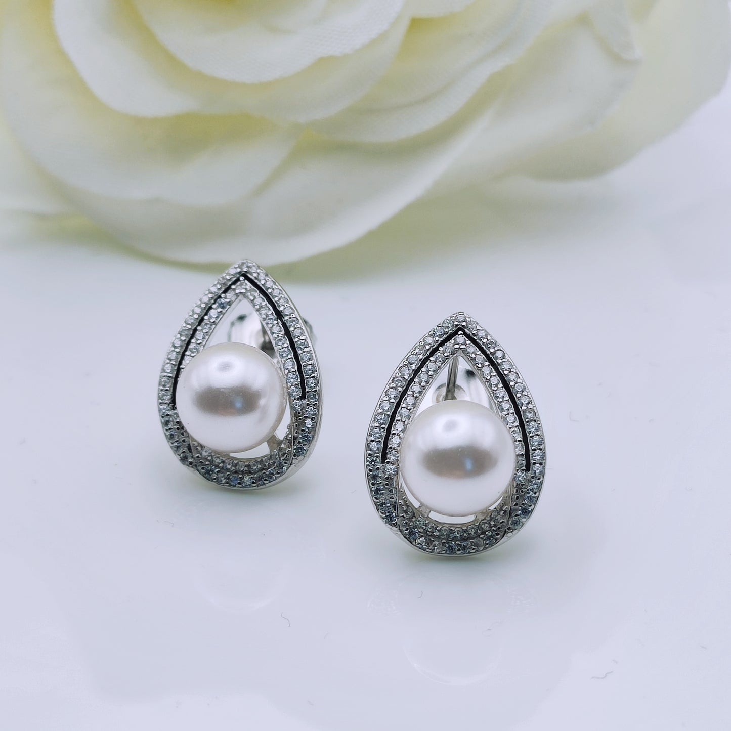 sterling silver shell pearl cubic zirconia stud earrings - Mia Ishaaq