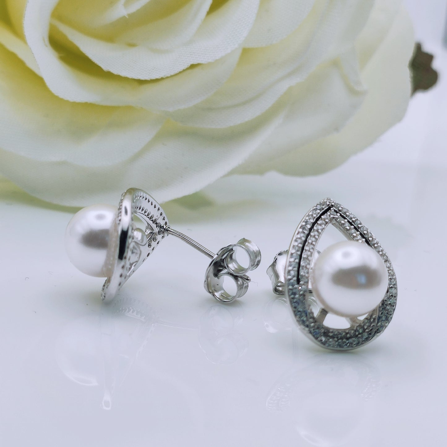 sterling silver shell pearl cubic zirconia stud earrings - Mia Ishaaq