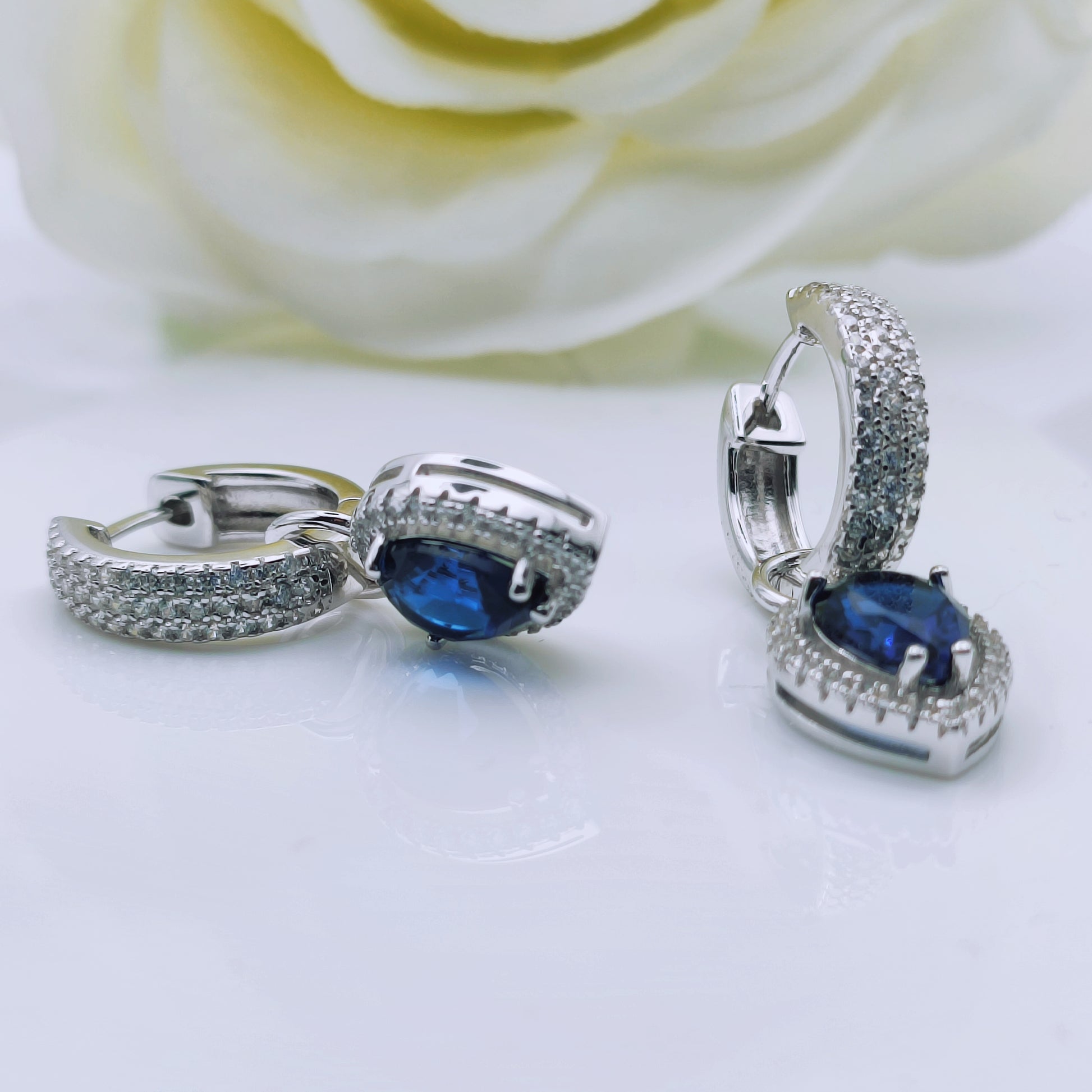 Sterling Silver Pave Round Loop Heart Shape Dangle charm Blue CZ center earrings - Mia Ishaaq